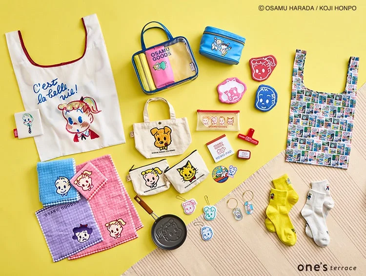 オサムグッズの様々なアイテムが並べられた様子